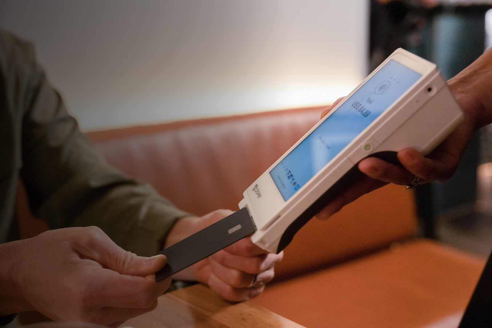 Customer paying at Clover Flex